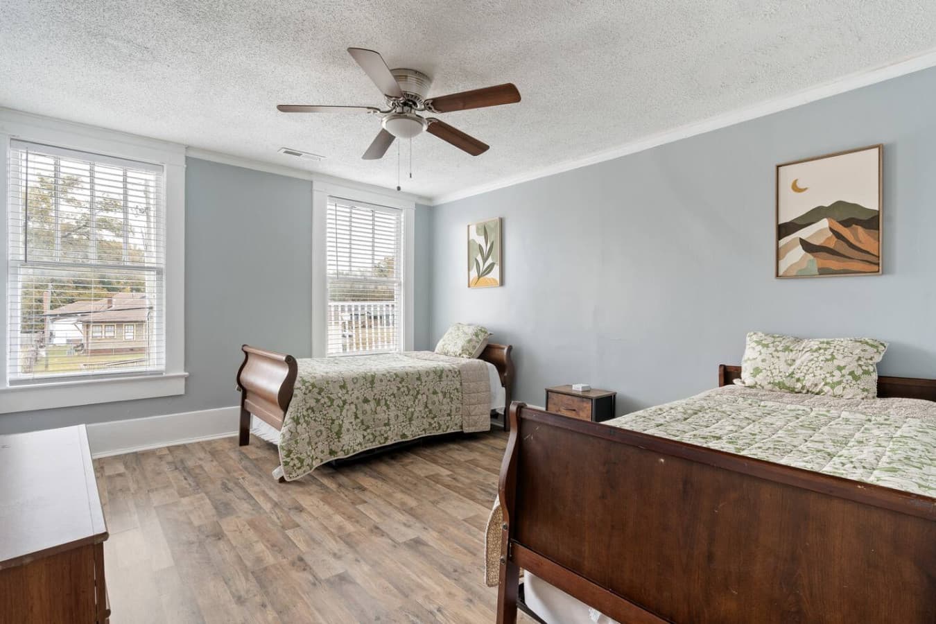 This bedroom offers two comfy beds and plenty of room to settle in for a restful stay.