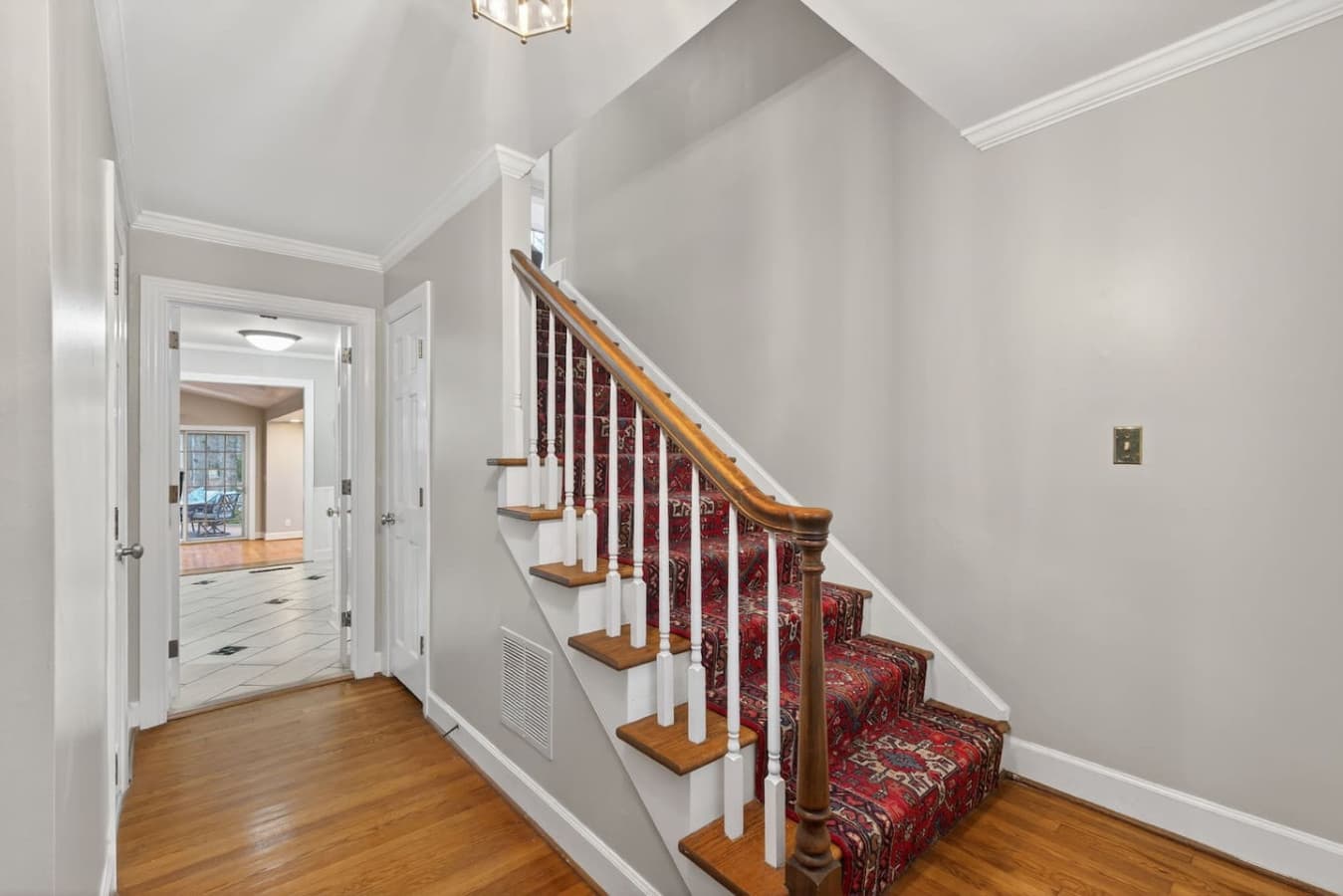 Easy access to the upstairs bedrooms and bath, designed for a smooth transition between floors.