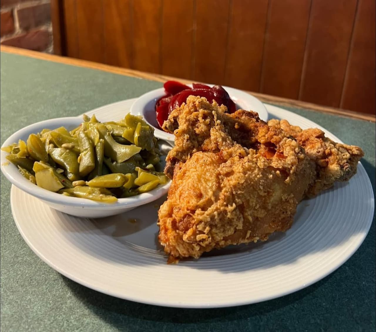 Just 8 minutes from the home, Fred’s serves favorites like their 1/4 Fried Chicken with two sides—a beloved local staple known for warm service, great food, and an elevated yet cozy hometown feel.