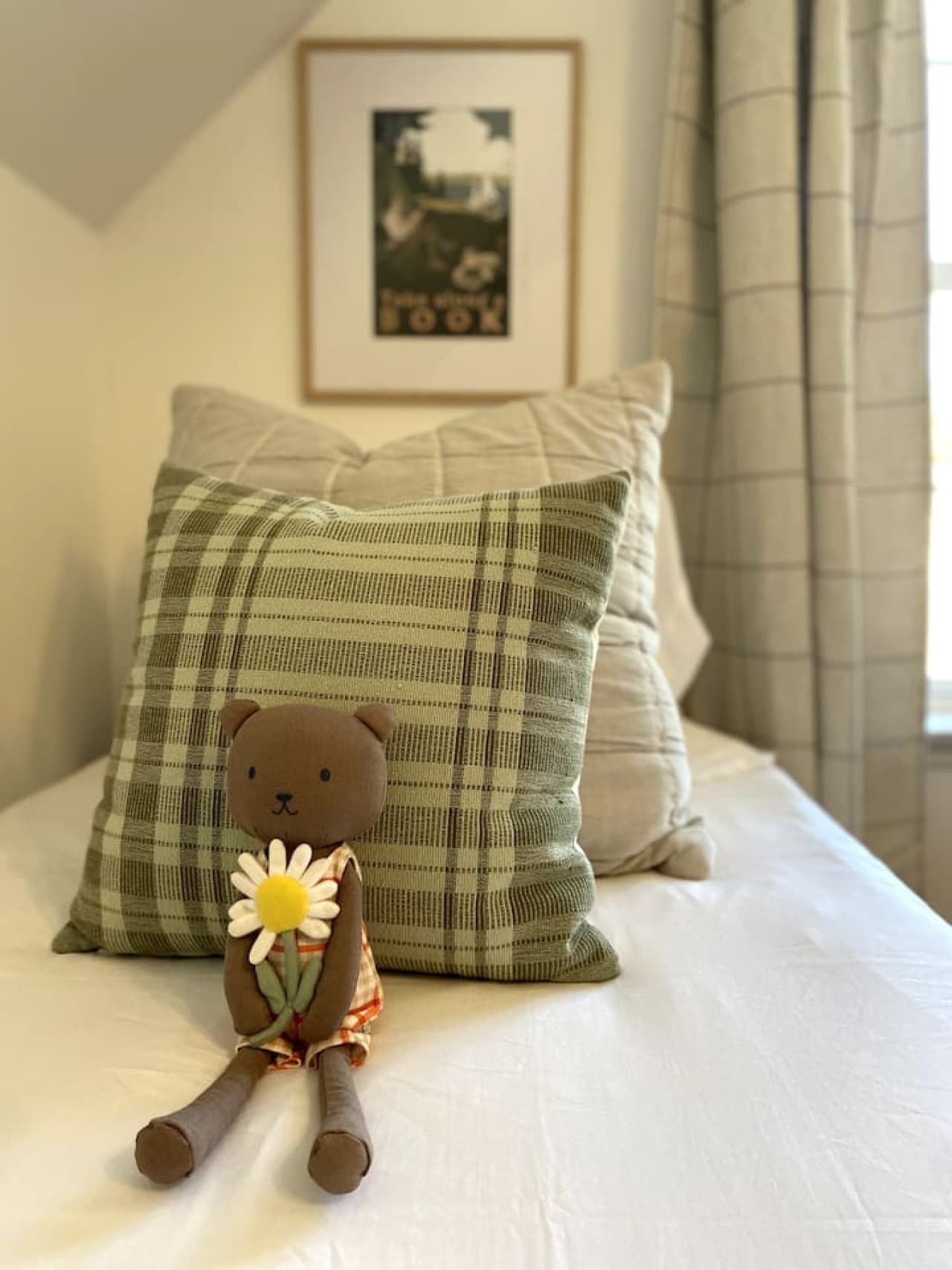 Thoughtful touches and plush toys make this twin room a warm, inviting space for kids or travel buddies.