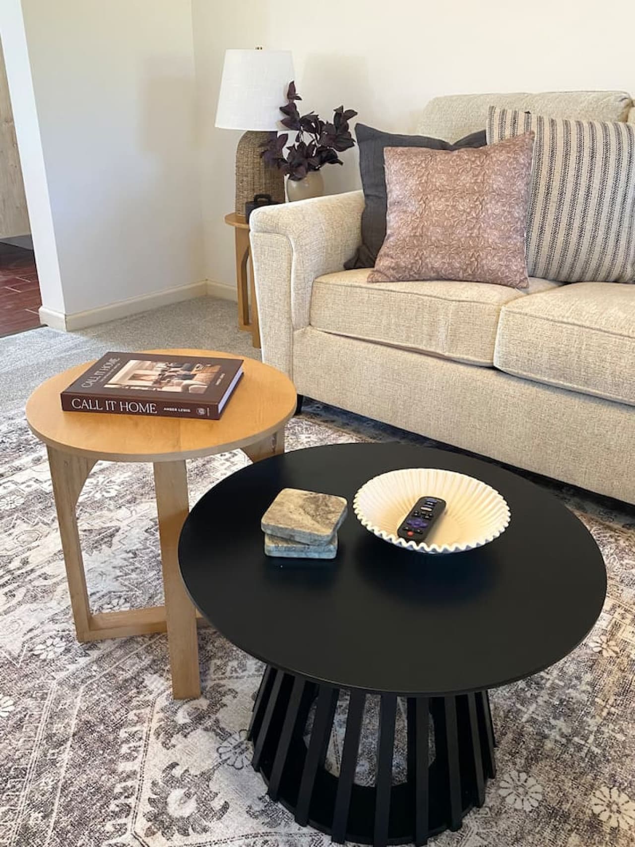 Stylish living area details with books and essentials for your stay.