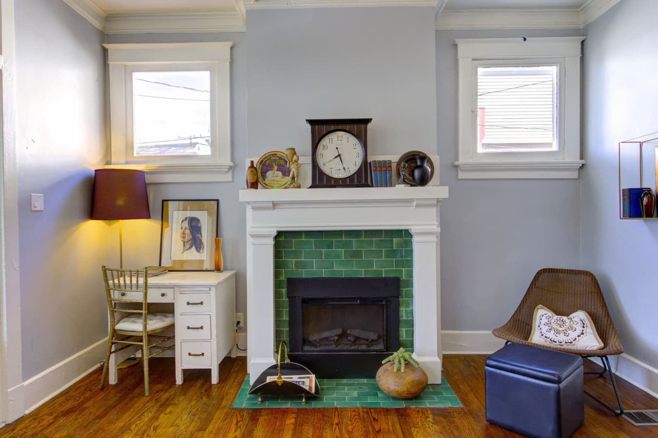 Little desk makes for a good workplace. Electric fireplace adds warmth in winter or cozy ambiance year-round with flame-only mode.