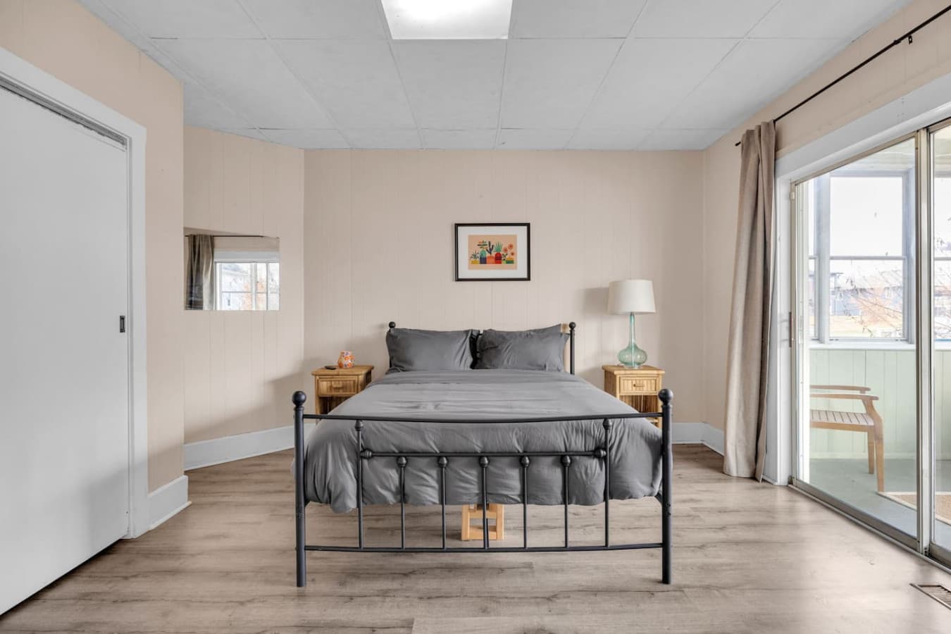 Queen bed + direct sunroom access = easy mornings.