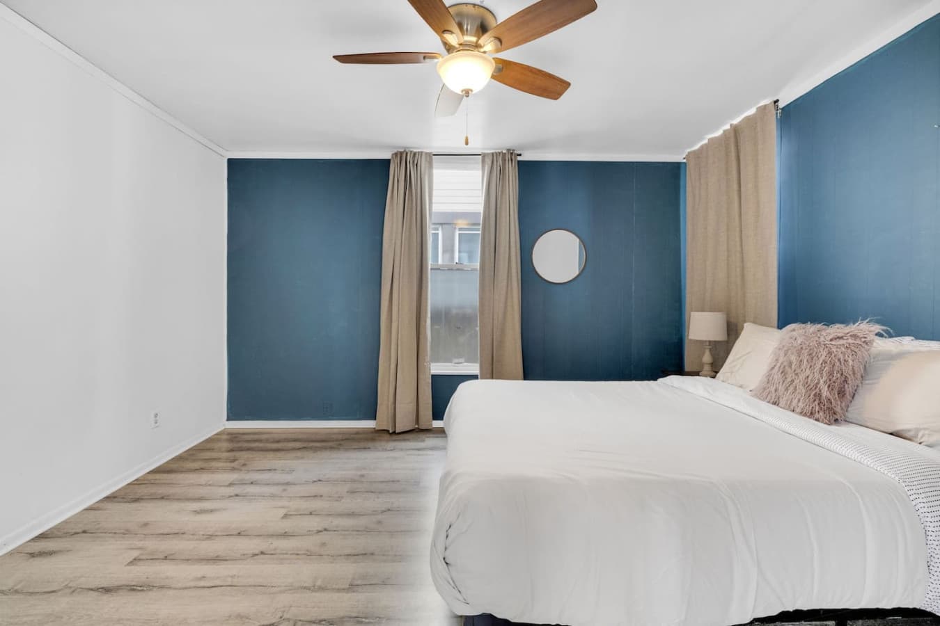 Queen bed vibes: nap, relax, repeat.