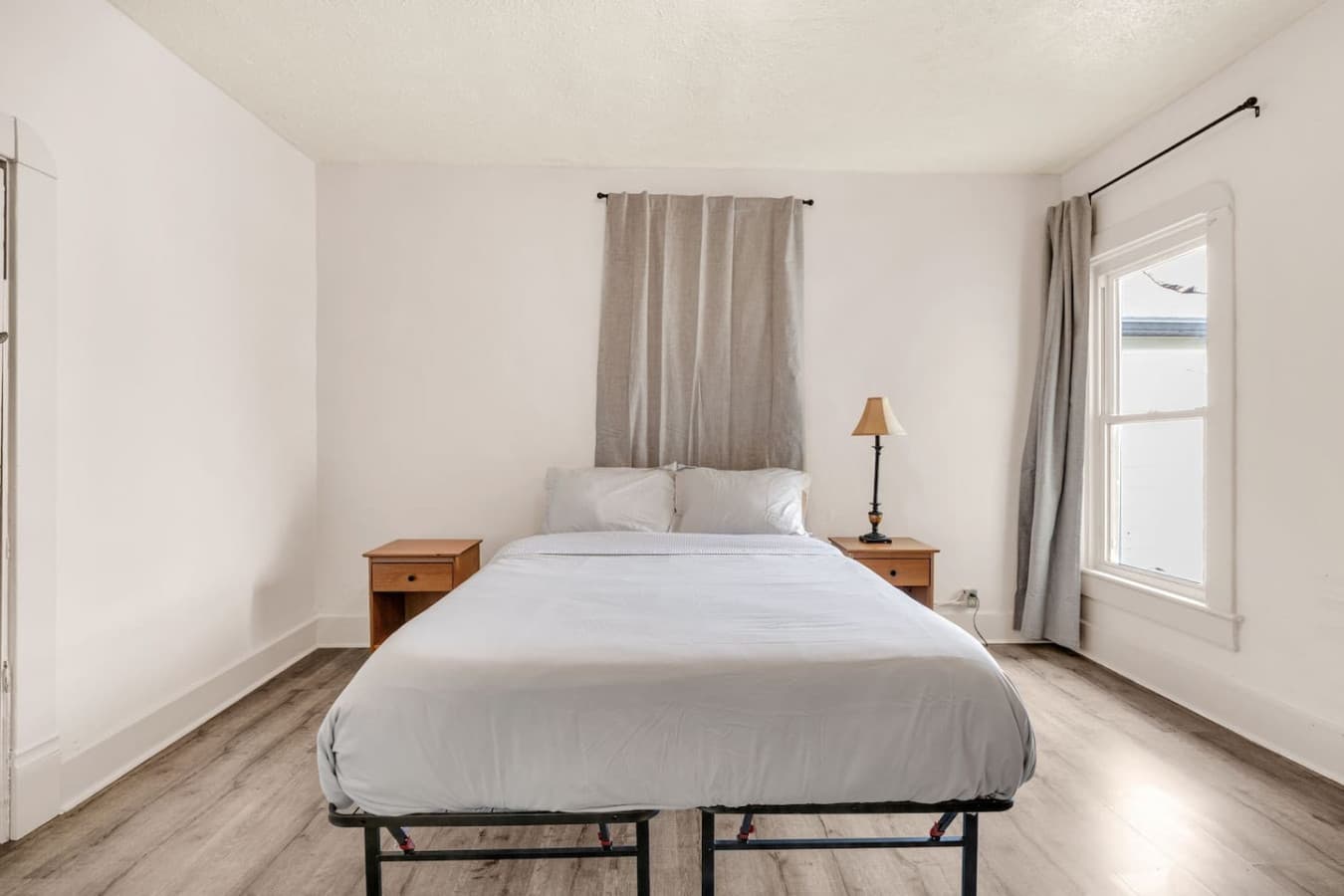 A queen bed that invites you to hit snooze… again.