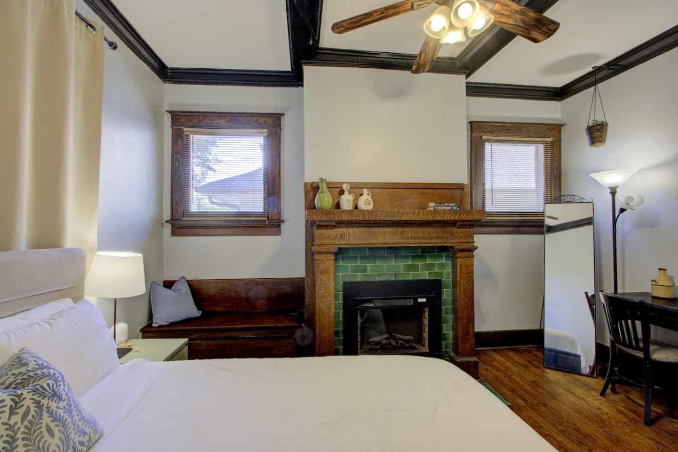 Charming antique desk in the corner, an inspiring spot to catch up on work or write during your stay.