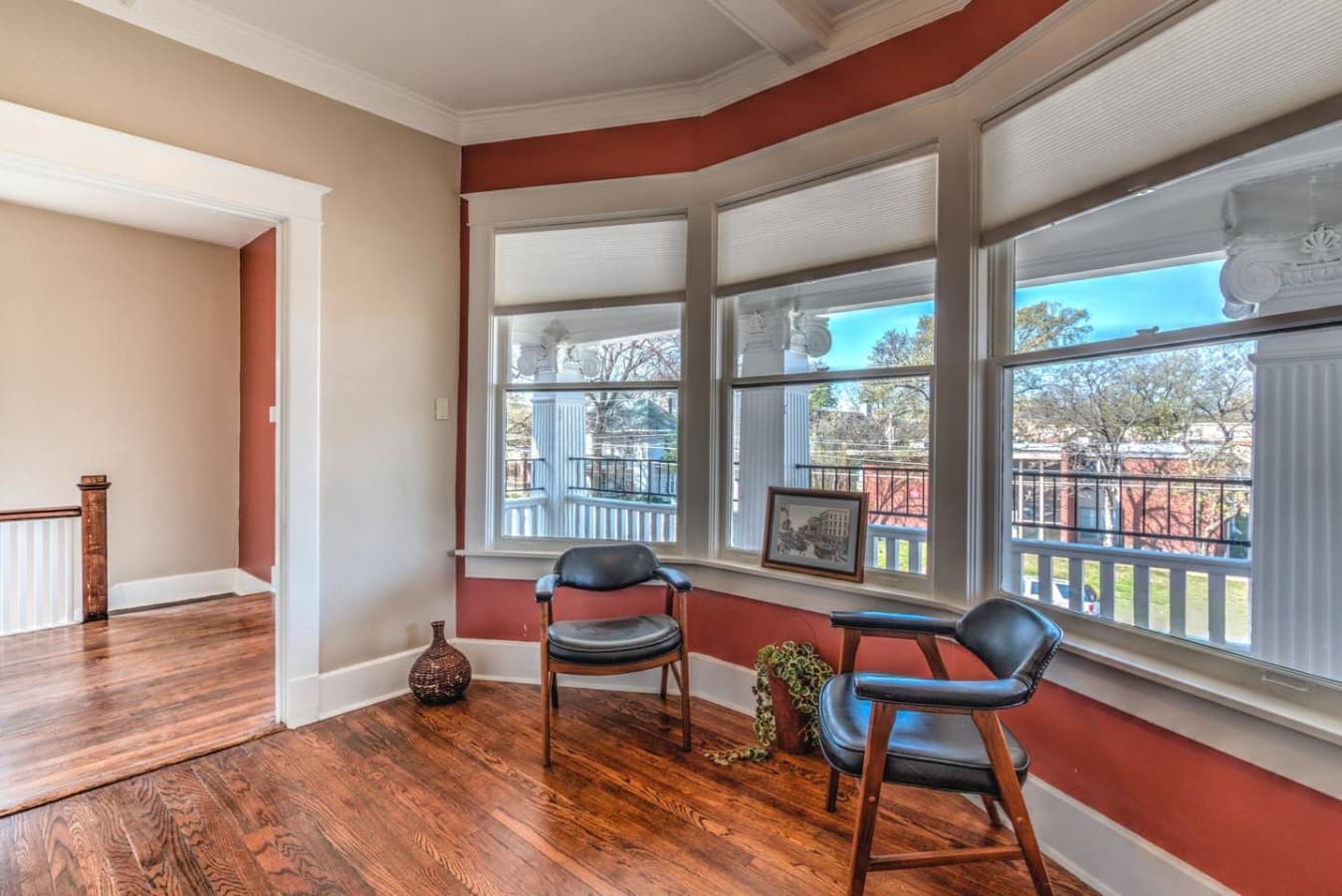 After going up the stairs, you’ll enter the common area that opens onto the large front porch, which you’re welcome to enjoy as well.