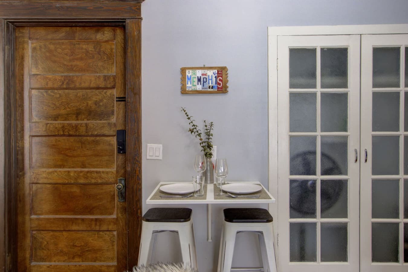 Cozy dining area with a 2-seat table.