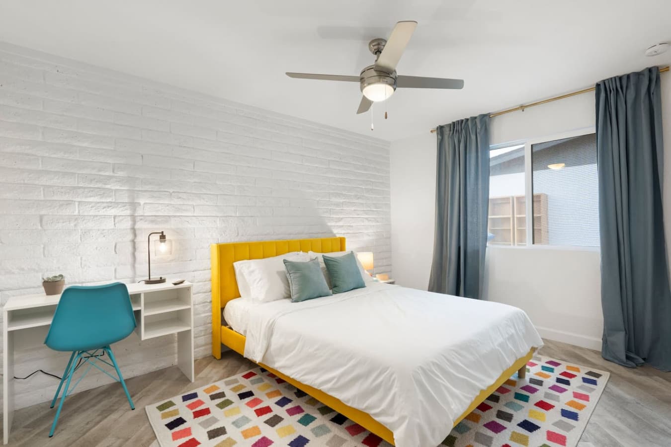 Bedroom 3 comes with a queen bed and dedicated workspace, perfect for remote work or studying!