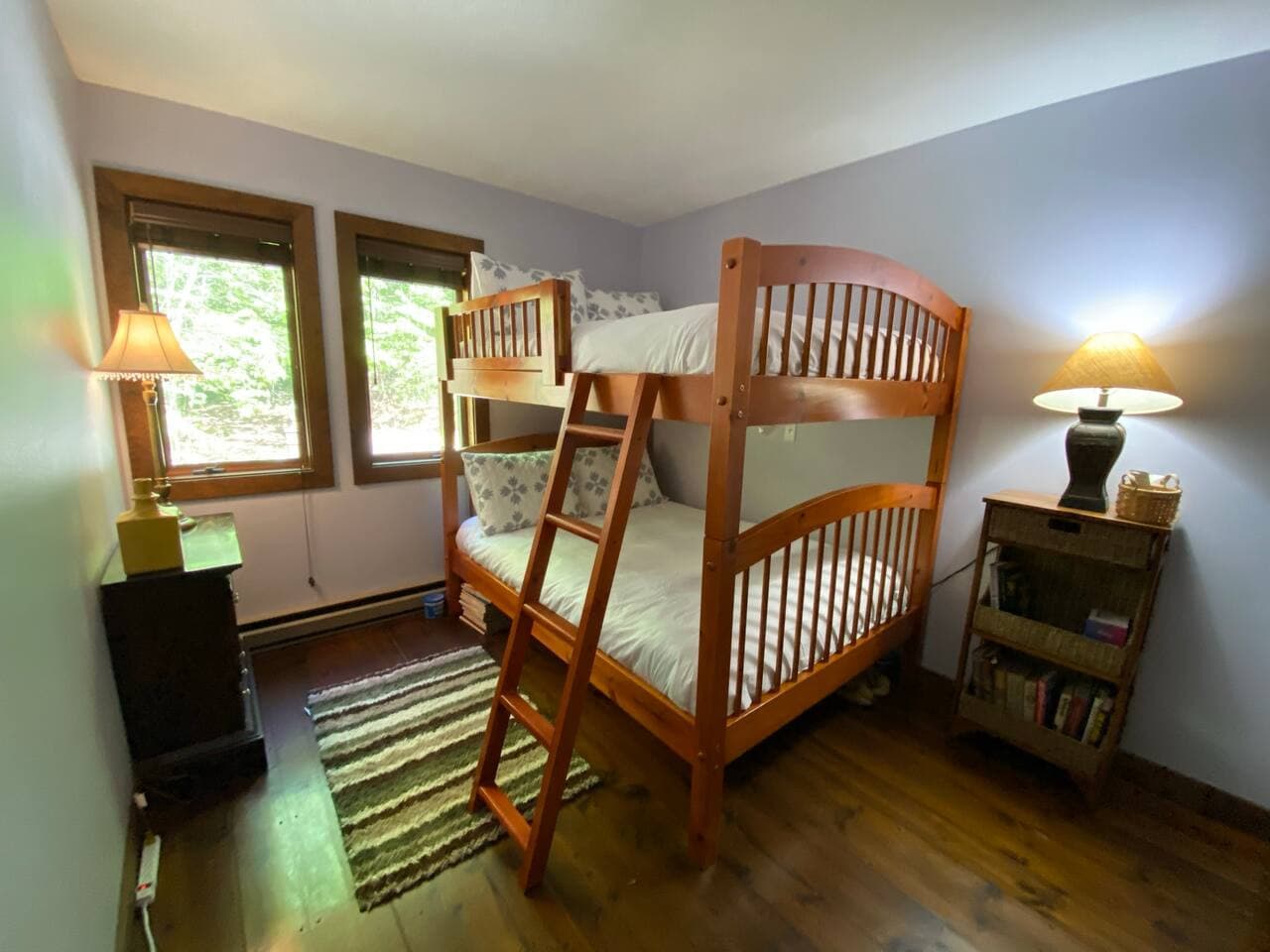 Who says bunk beds are just for kids? This queen-on-queen setup will make you feel like royalty—on both levels.