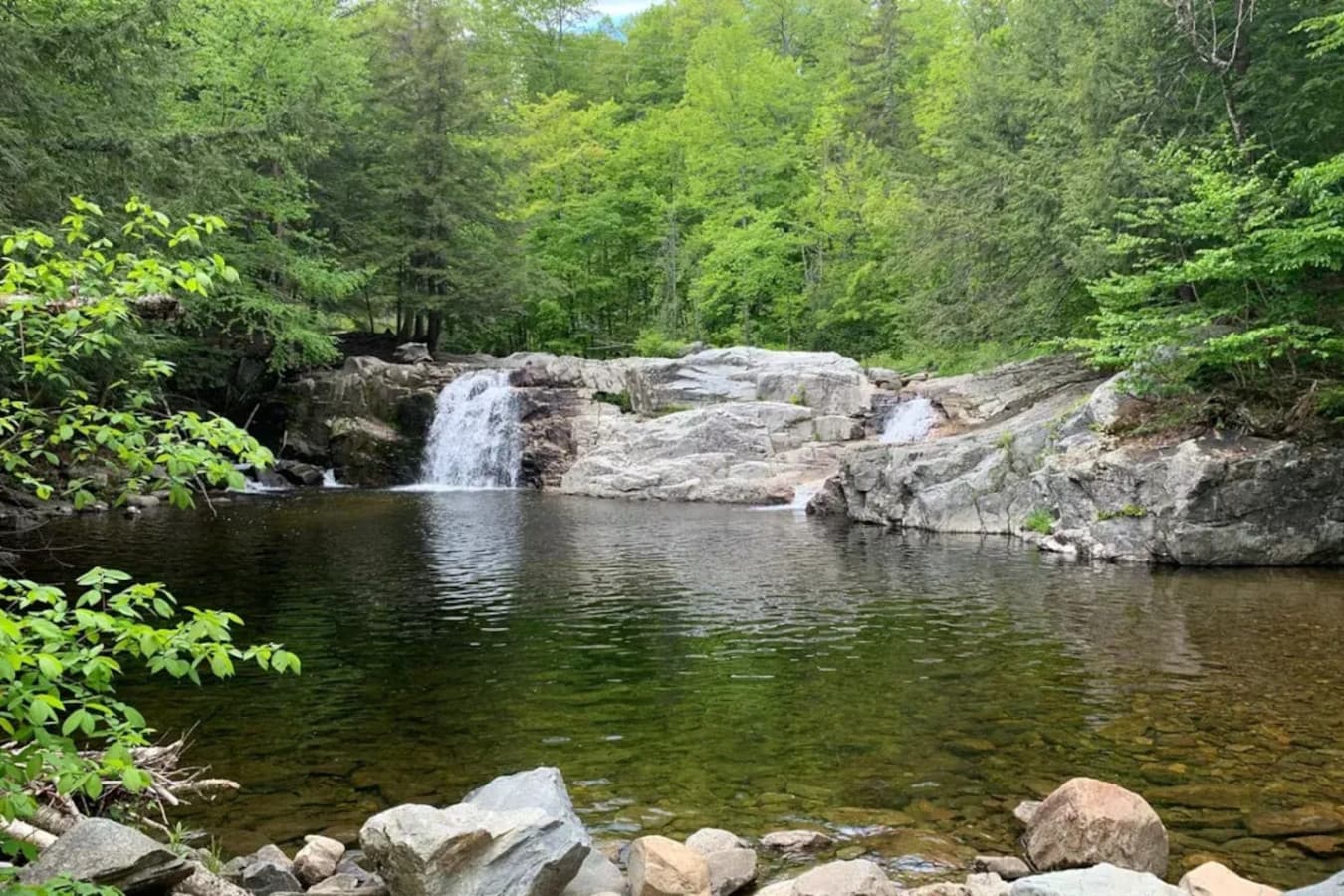 Only 15 minutes from your doorstep, Buttermilk Falls invites you to unwind in the serene surroundings of cascading waterfalls and lush landscapes.