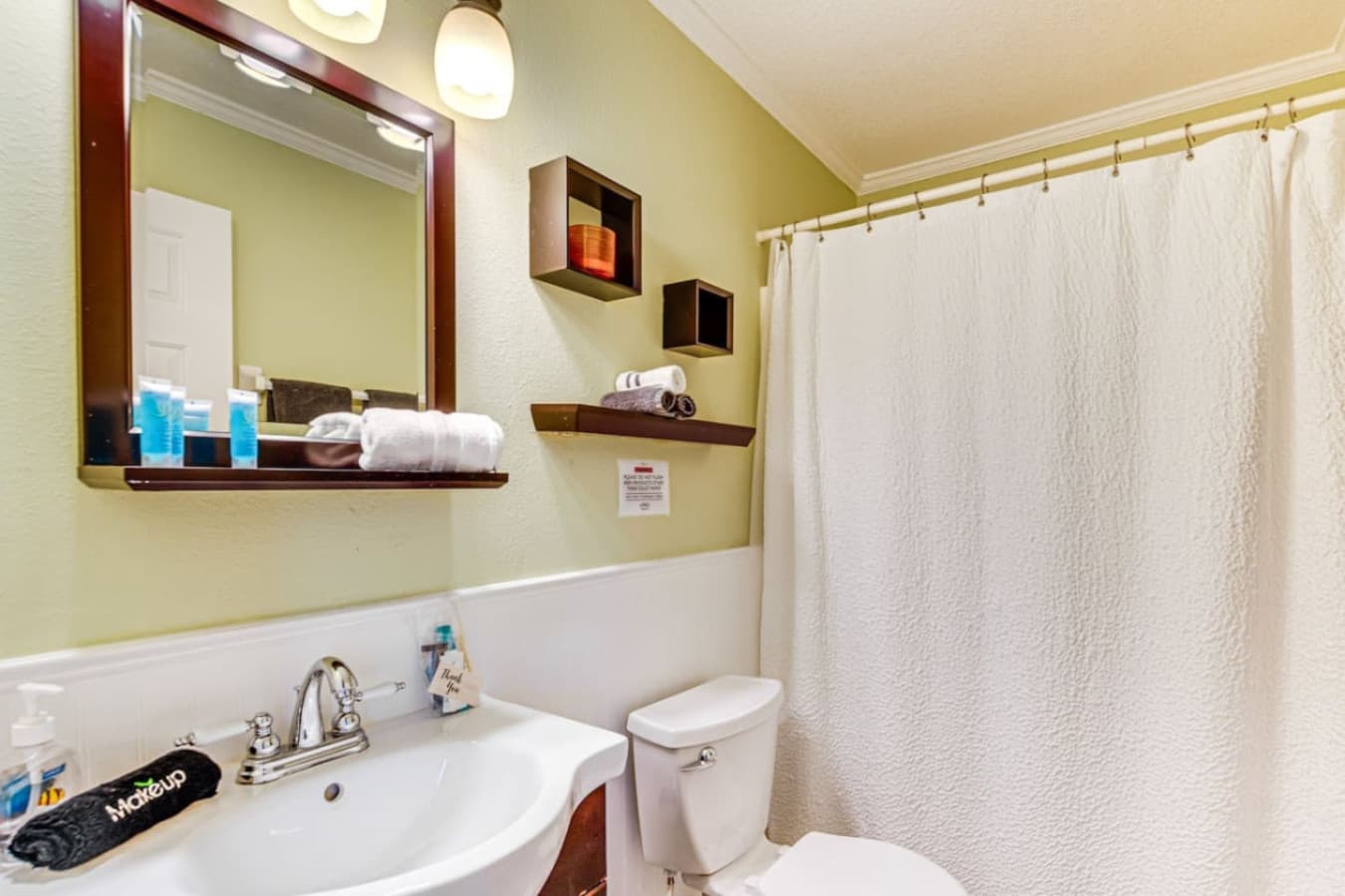 Clean and modern bathroom with fresh towels and essentials.