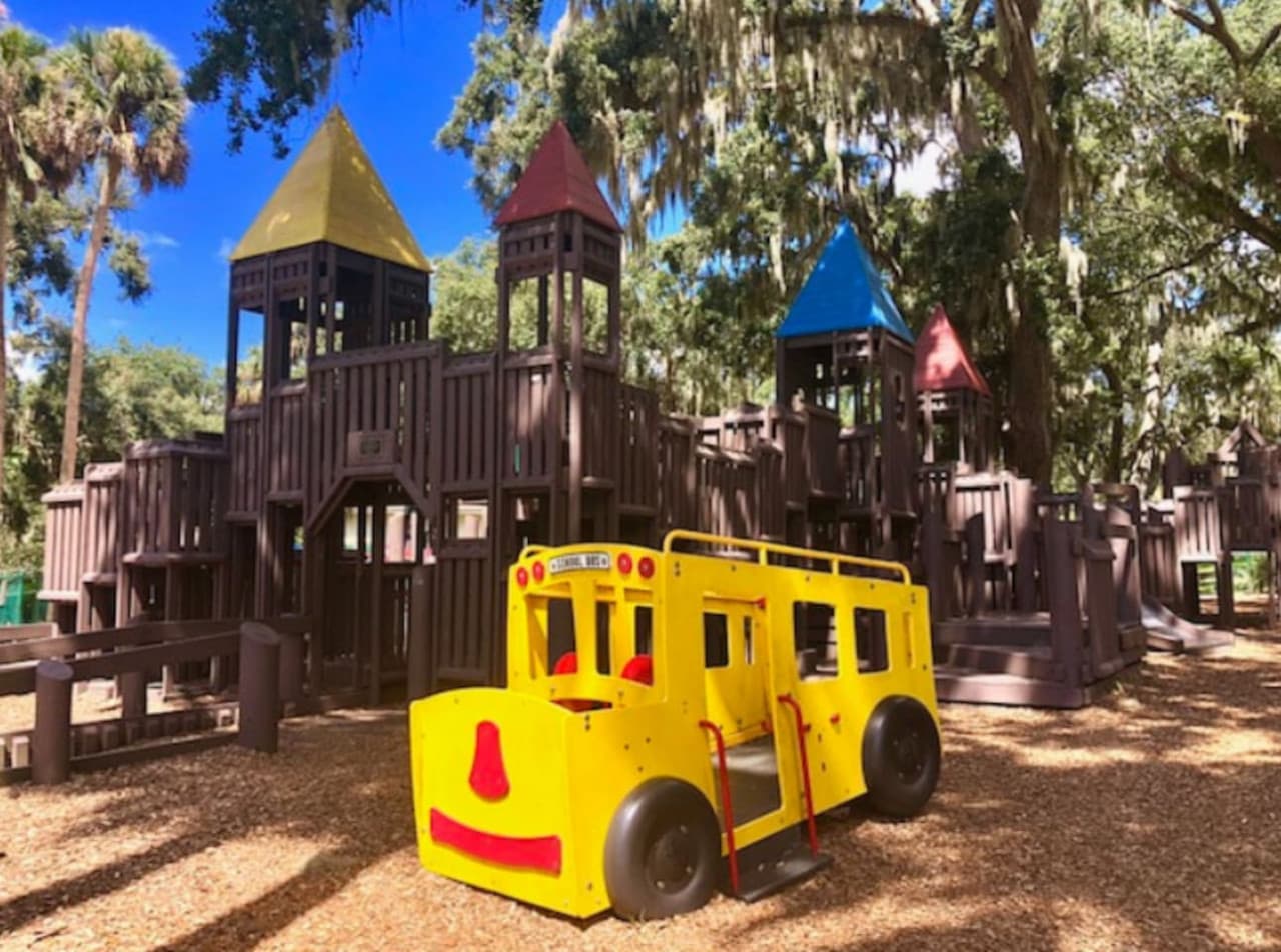 Let the little ones play under the trees at Gilbert Park’s spacious and shaded playground.