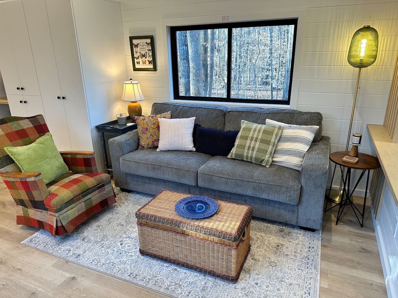 Luna Studio: With its warm hardwood floors and large windows, this living area invites you to kick back and enjoy your stay.