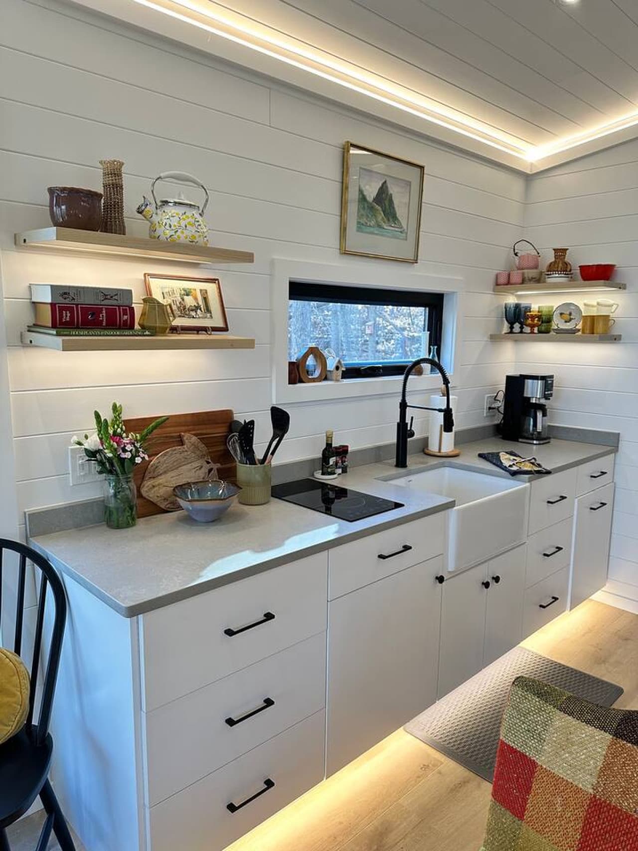 Luna Studio: A modern kitchen with beautiful birch cabinetry and quartz countertops – ideal for preparing your favorite meals.