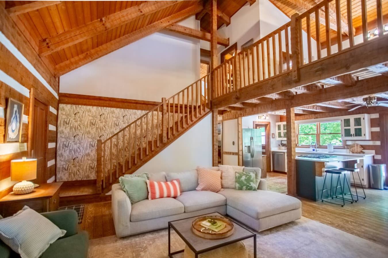 Cabin on the Haw: Warm wood tones and soft seating make this corner a cabin favorite.
