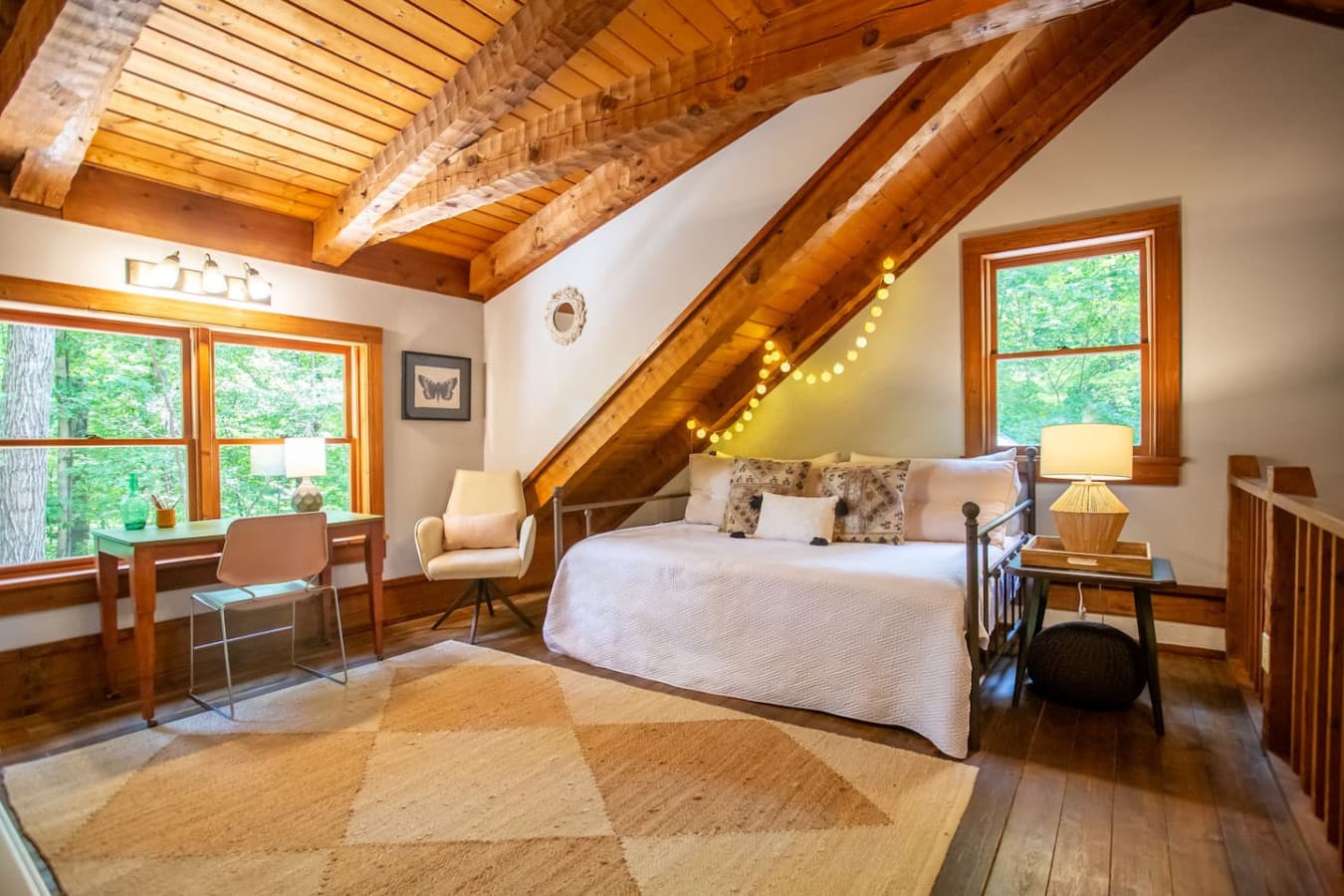 Cabin on the Haw: Treetop dreams made for two—or four. Queen bed + queen trundle = plenty of room.