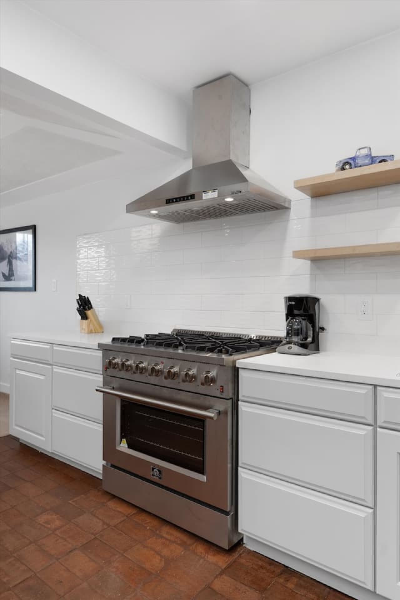 A bright, modern kitchen with sleek stainless appliances—ready for everything from quick bites to full feasts.