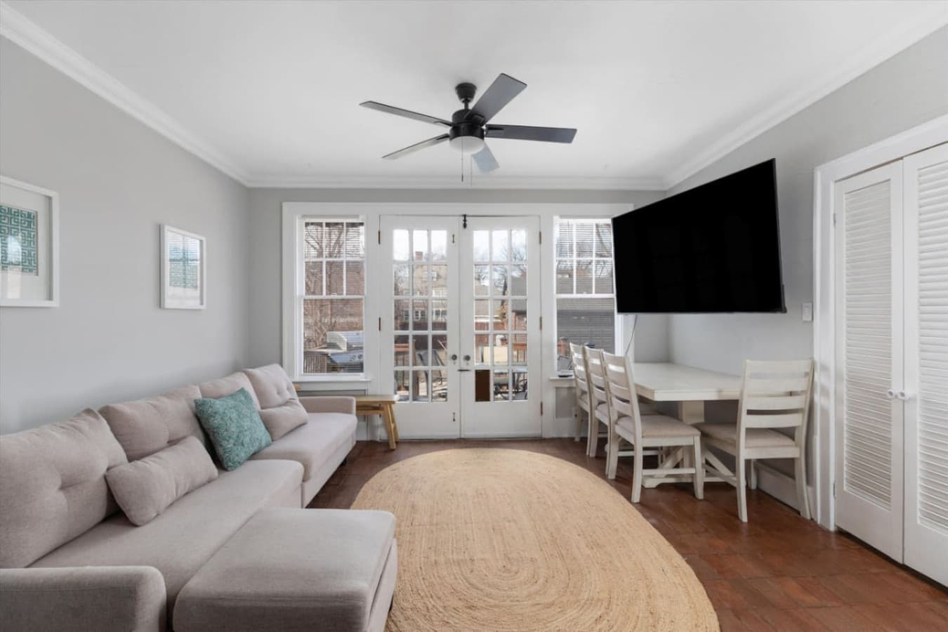 Your casual hangout zone—an L-shaped sofa and bright, open layout perfect for kicking back.