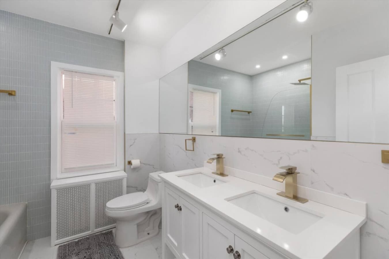 Refresh and recharge in this stylish full bathroom, complete with modern fixtures and a tub/shower combo.
