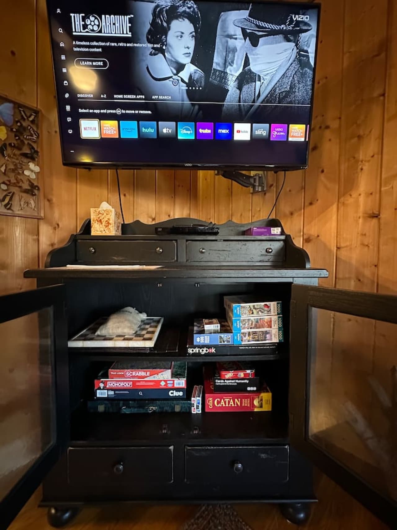 Smart TV with streaming capabilities, plus board games and puzzles for added entertainment.
