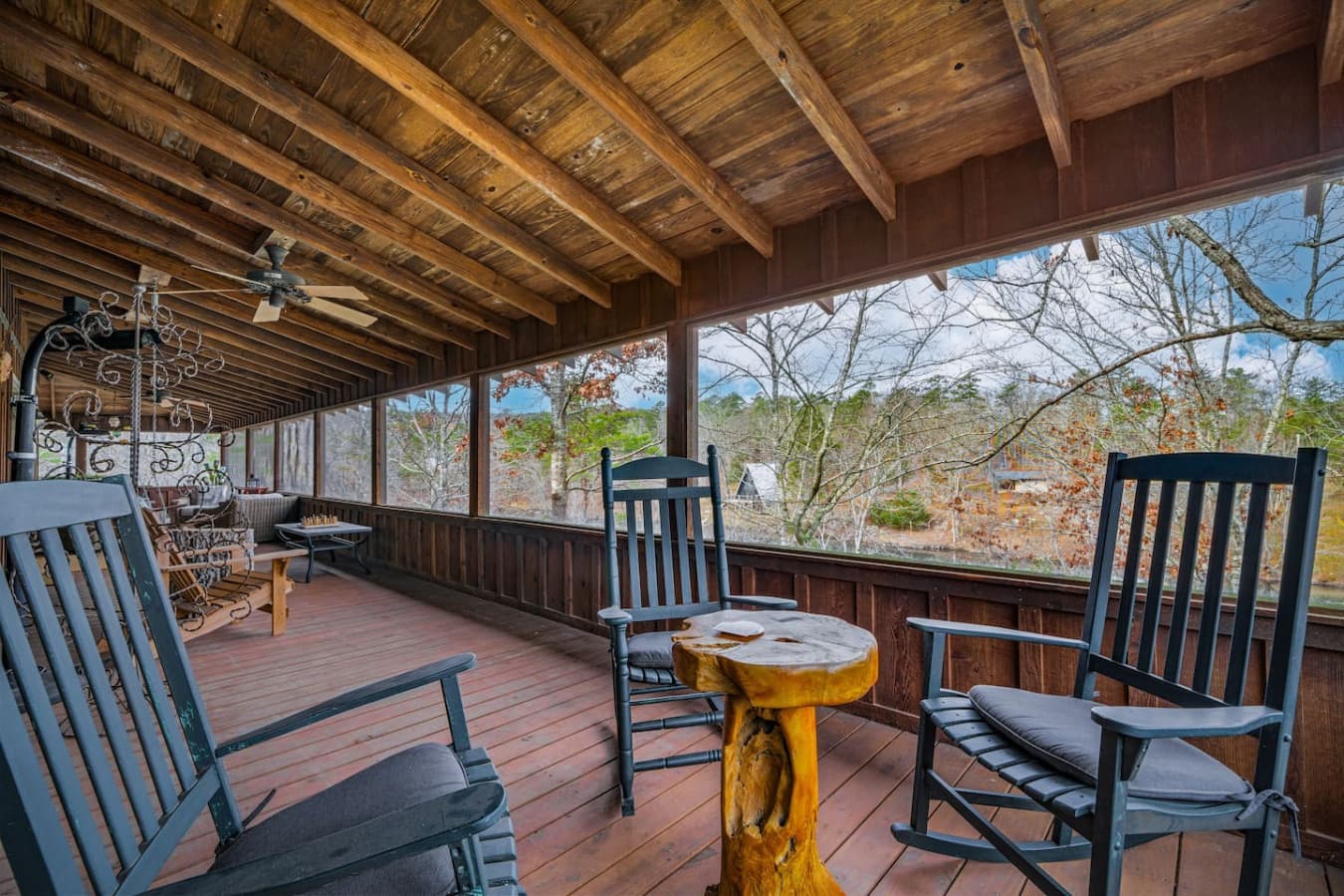 Stunning views from the screened-in back porch seating area.