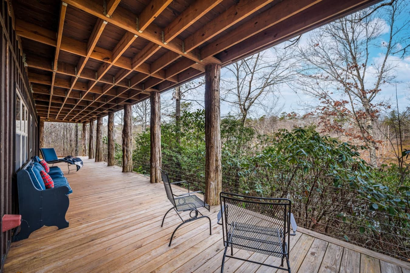 Lower deck with stunning views of the rhododendrons and the river/lake.