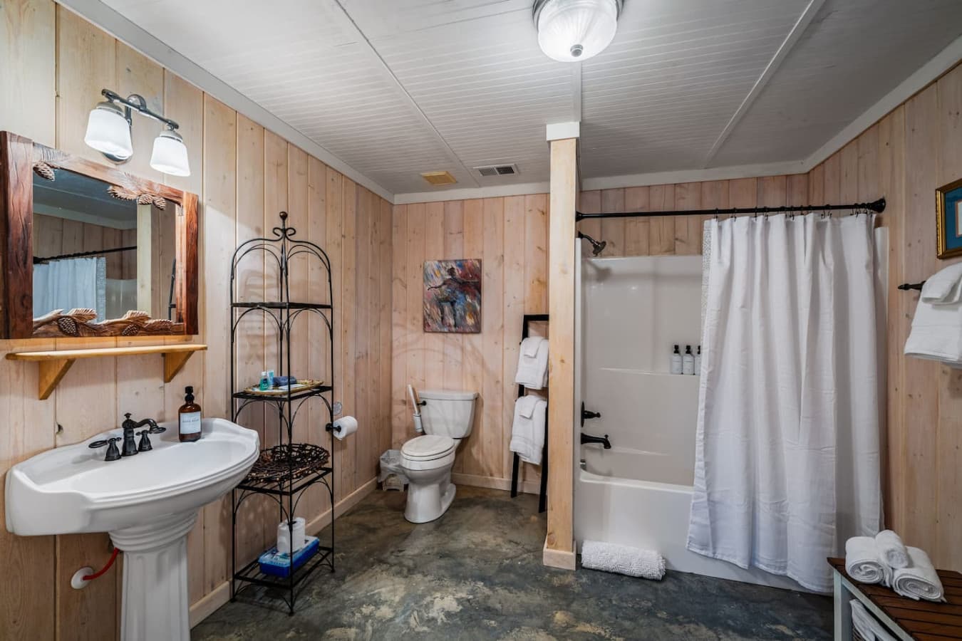 Full Bathroom 3 (Downstairs) with a tub/shower combo.