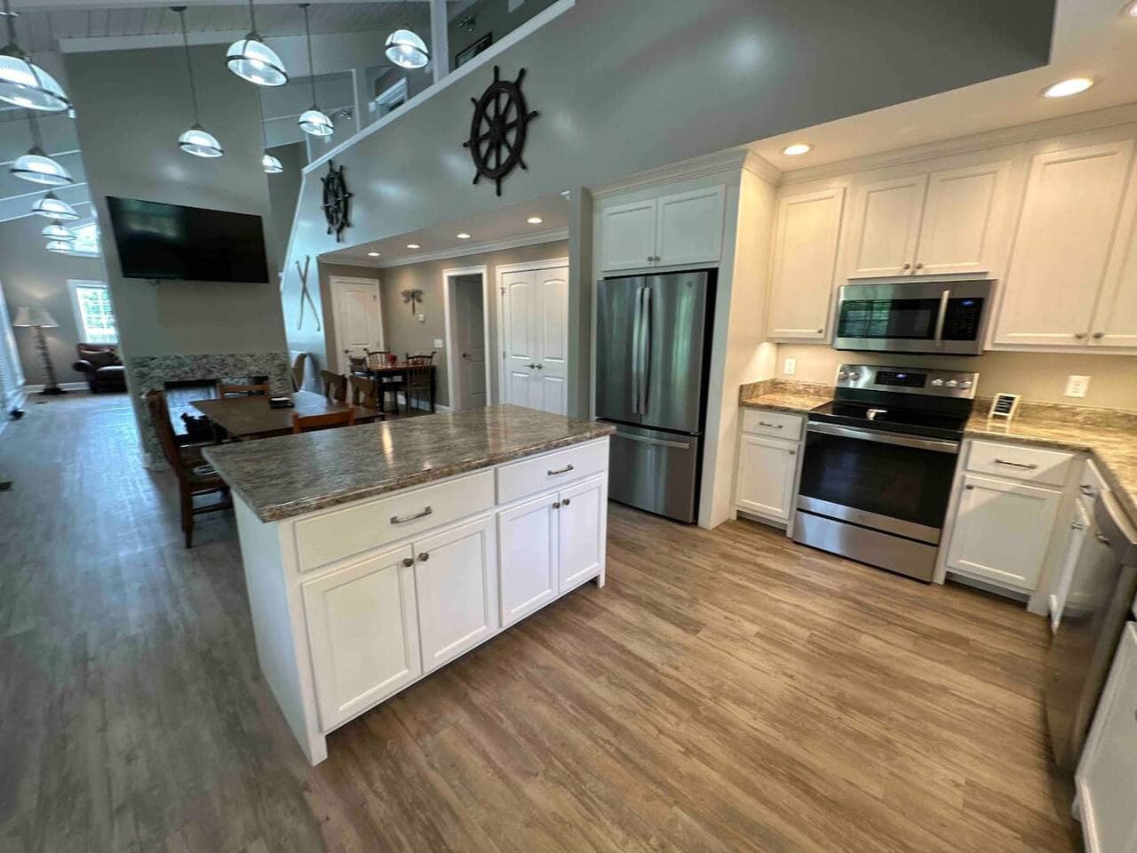 Spacious island serving as both a functional workspace and casual dining area, blending seamlessly with the kitchen’s modern design.