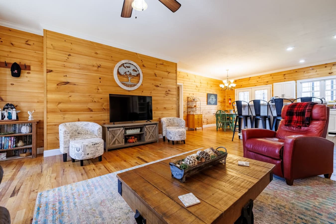 Rustic charm, soft lighting, and a comfy couch make this the ideal TV lounge after a day of adventure.