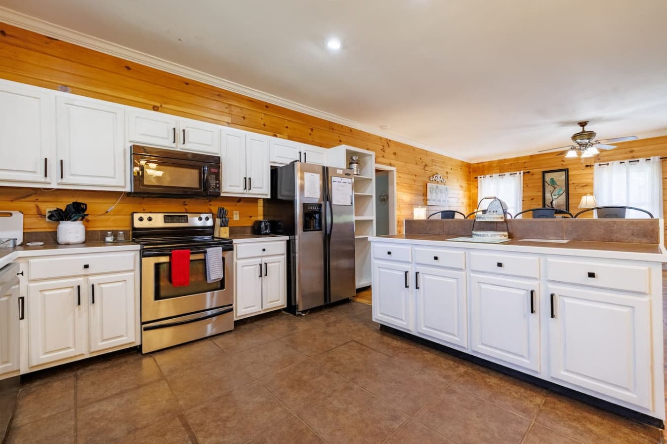 Expansive kitchen with a sleek island—ideal for cooking, dining, and gathering in style.