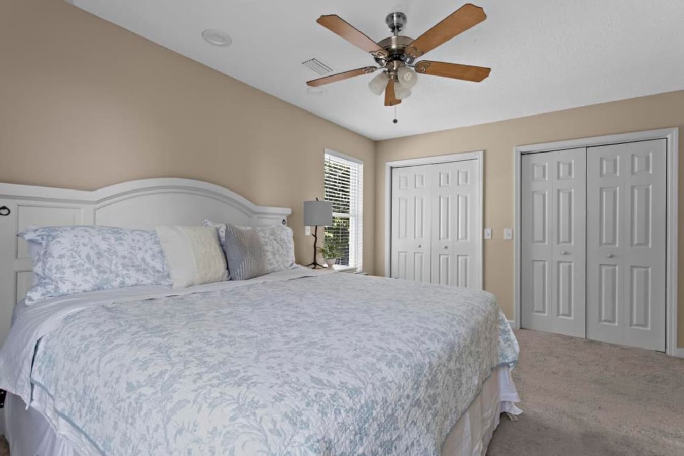 Sink into relaxation in the master suite, featuring a king bed bathed in natural light and a private ensuite bath for your ultimate comfort.