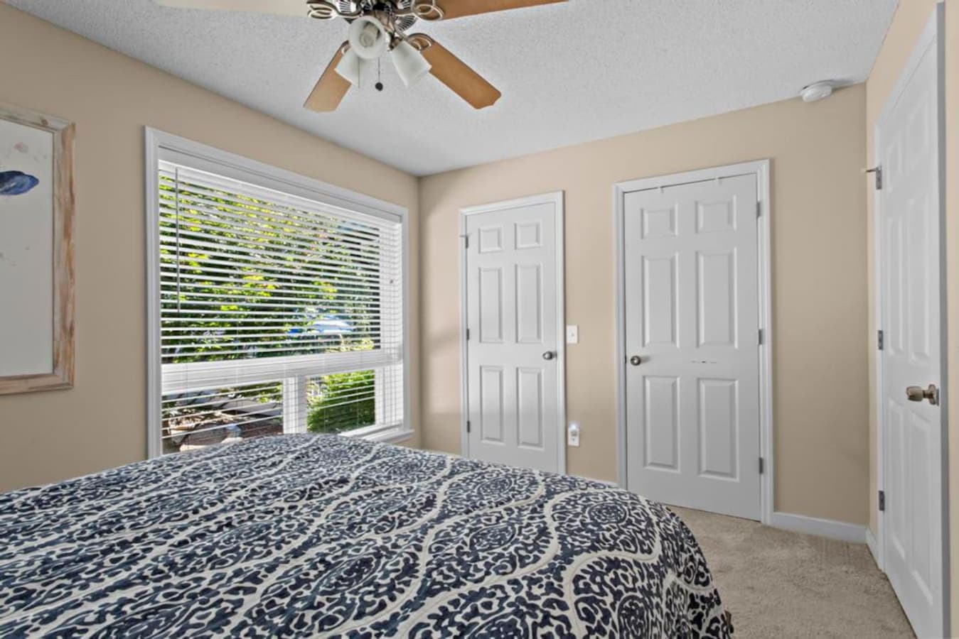 Drift into tranquility in this cozy retreat, where a plush queen bed, generous closet space, and calming natural surroundings create the perfect space to recharge.