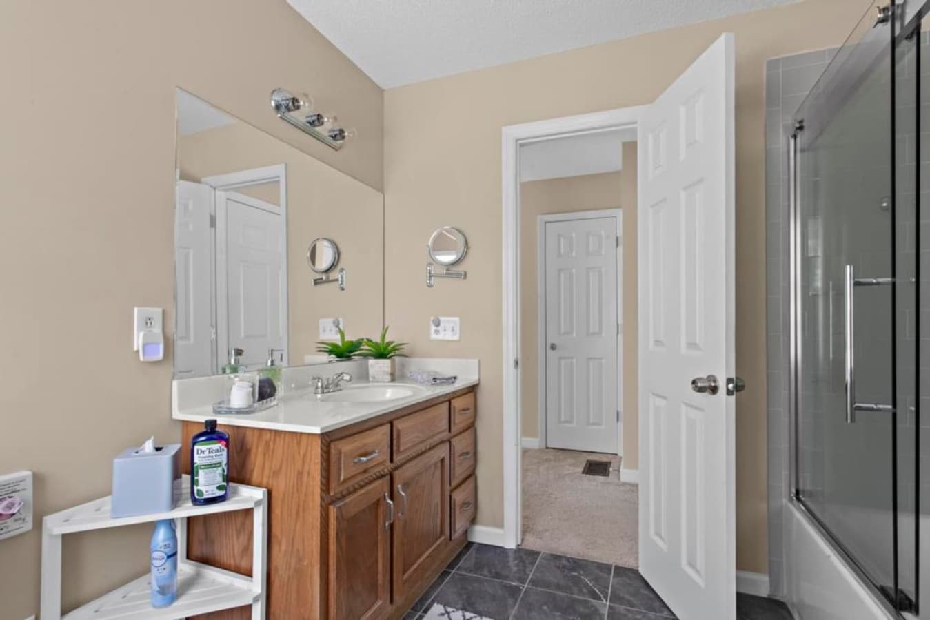 A bright vanity space to refresh and unwind.