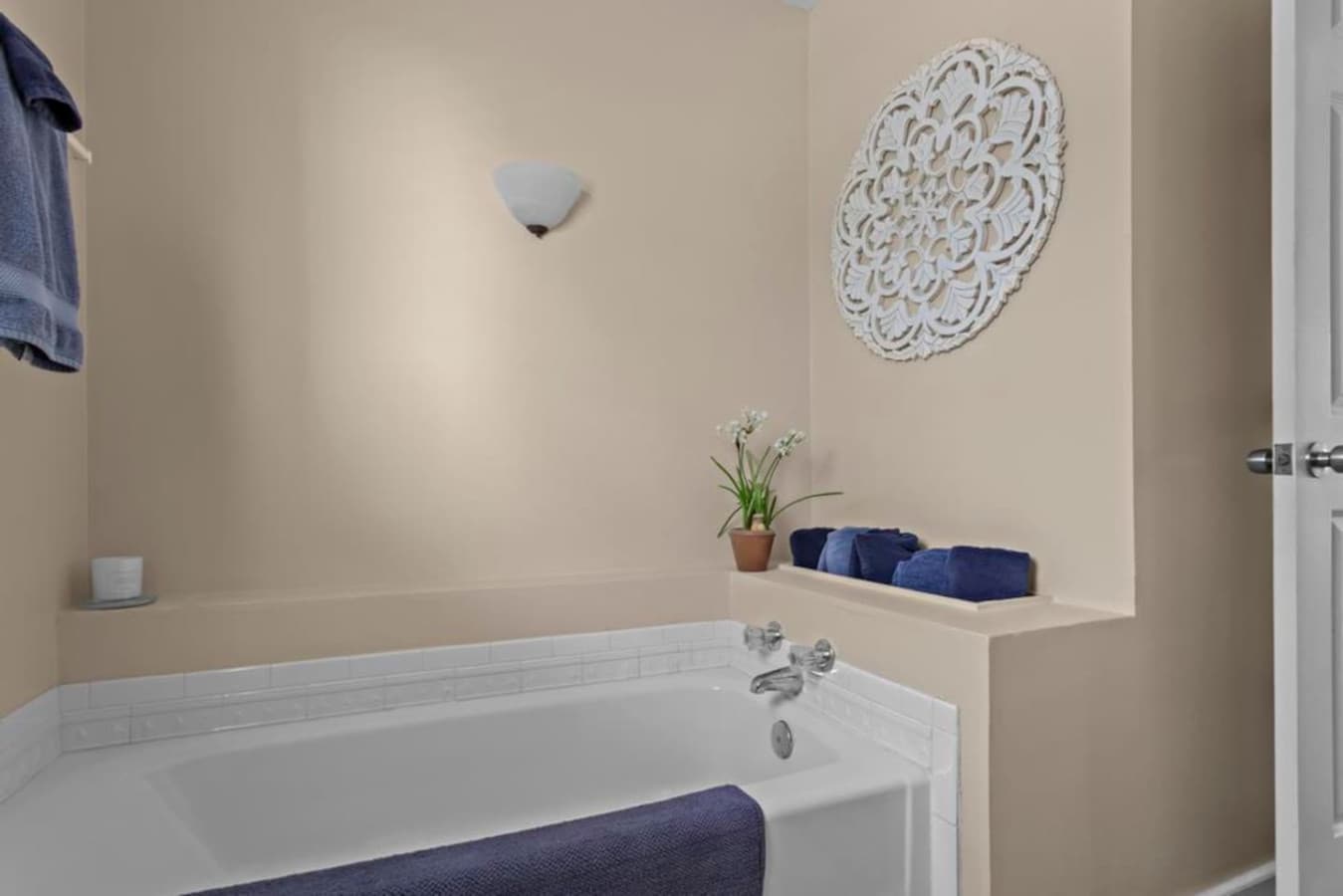 A bathtub is available here as well as a separate shower.