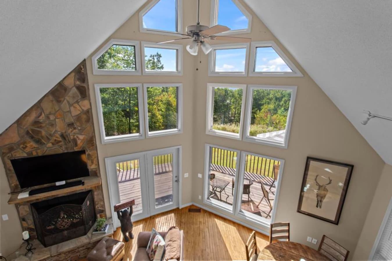 Living/dining area view from the loft, lots of natural light during daytime!
