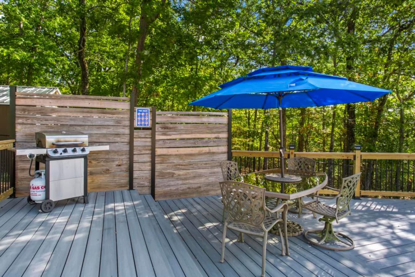BBQ grill and outdoor dining furniture available on the pool deck.