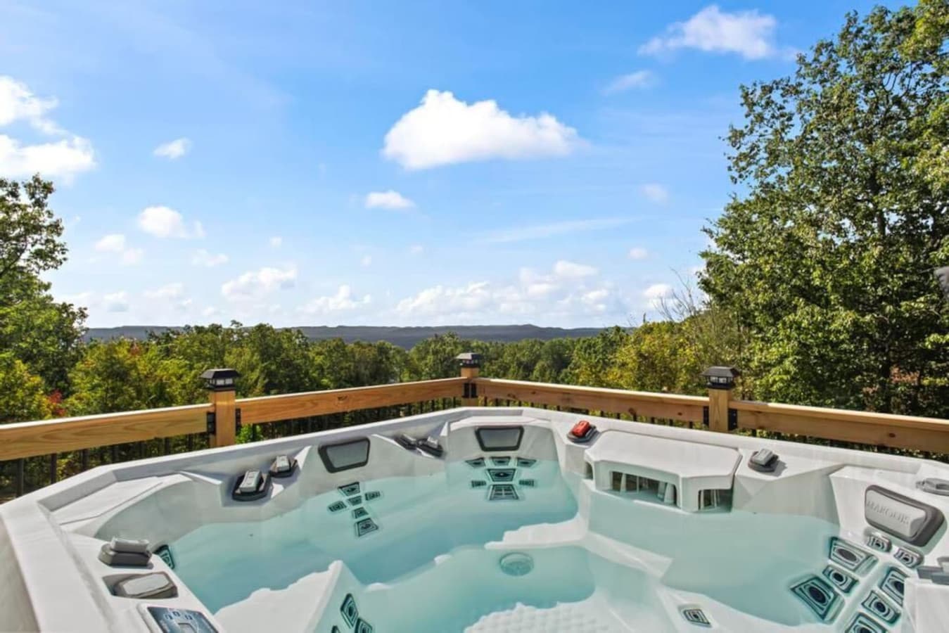 Begin your day soaking in the hot tub, where sweeping morning views surround you.