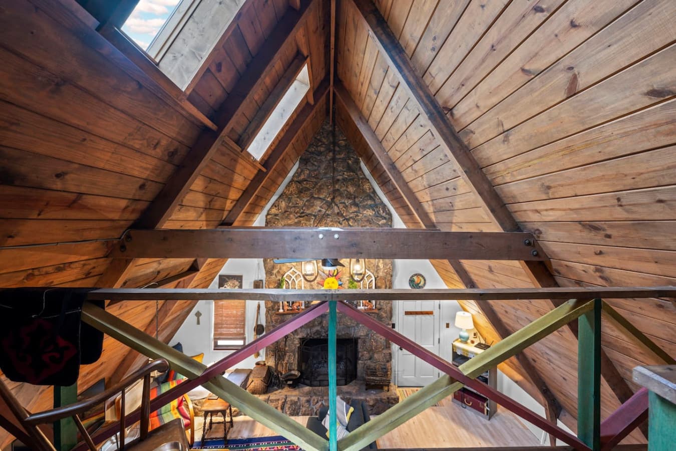 The view of the living area from the loft above.