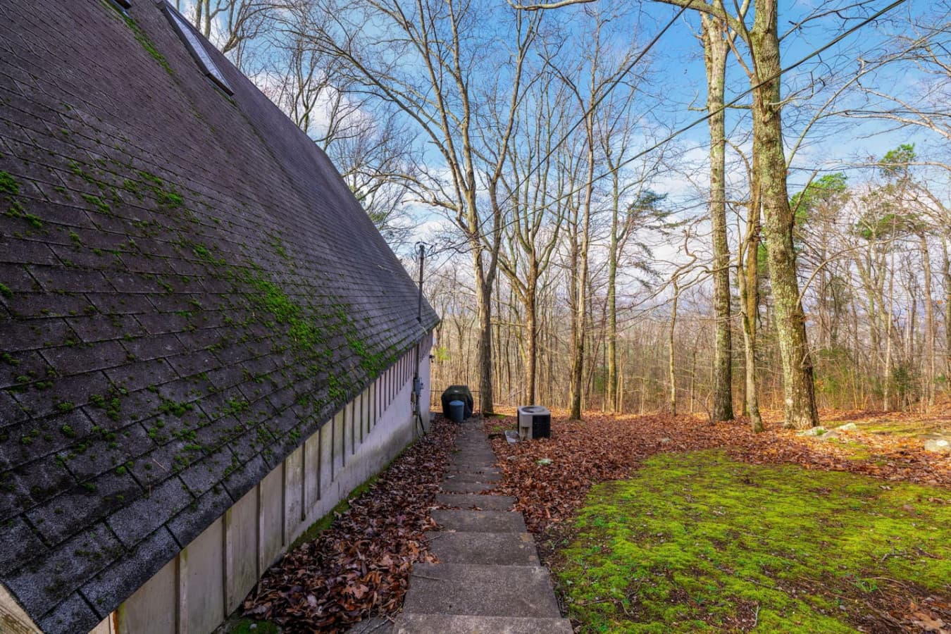 Enjoy the fresh air and beautiful scenery from this serene backyard retreat.