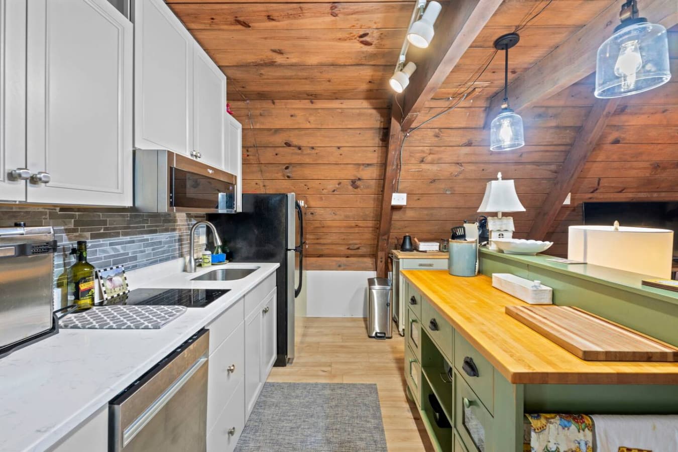Modern convenience meets efficiency in this thoughtfully designed kitchen.