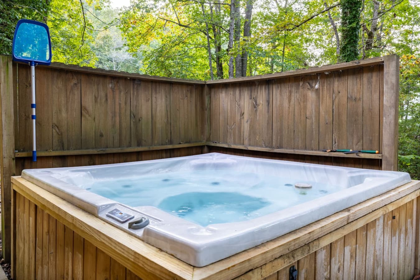 Private hot tub overlooking the Little River.