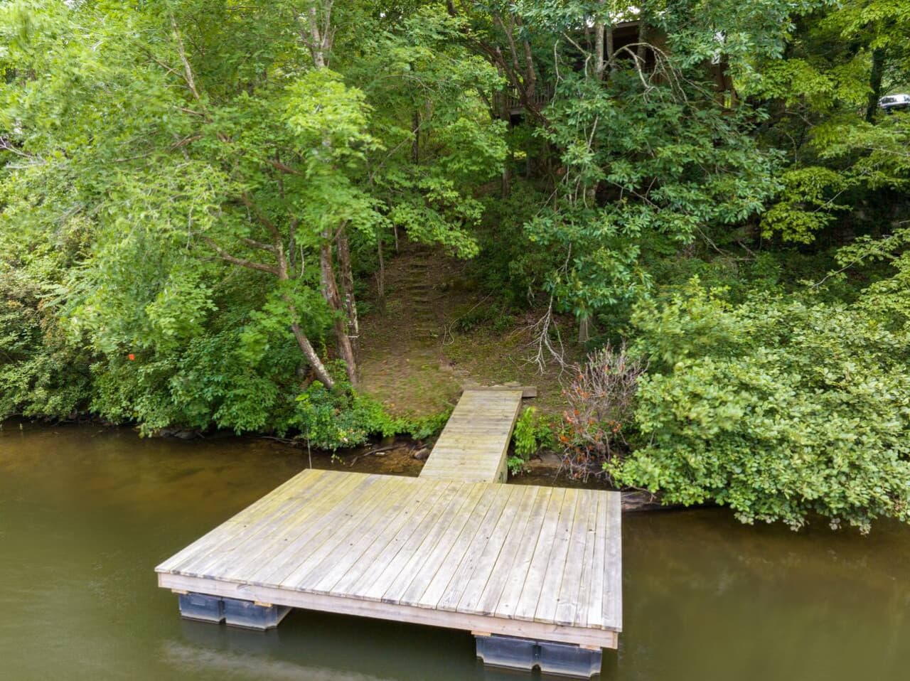 Private dock for fishing, swimming, or relaxing.