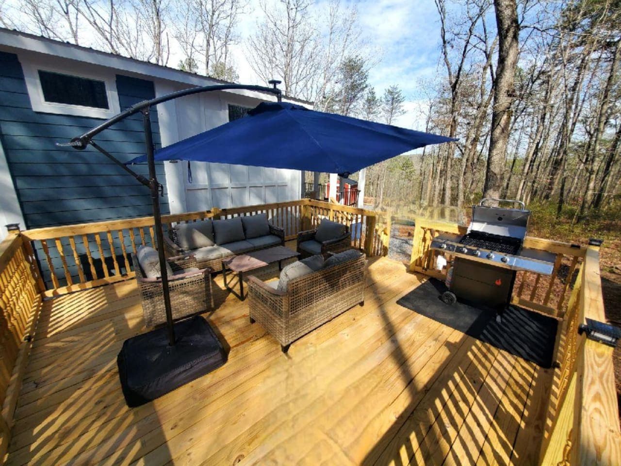 Dine, relax, or grill under the umbrella on this inviting riverside deck.