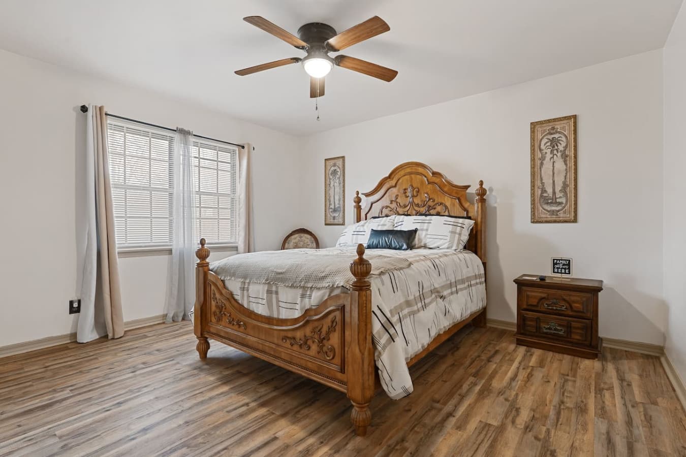 Relax in the downstairs master bedroom with a cozy queen bed and convenient main-level access.