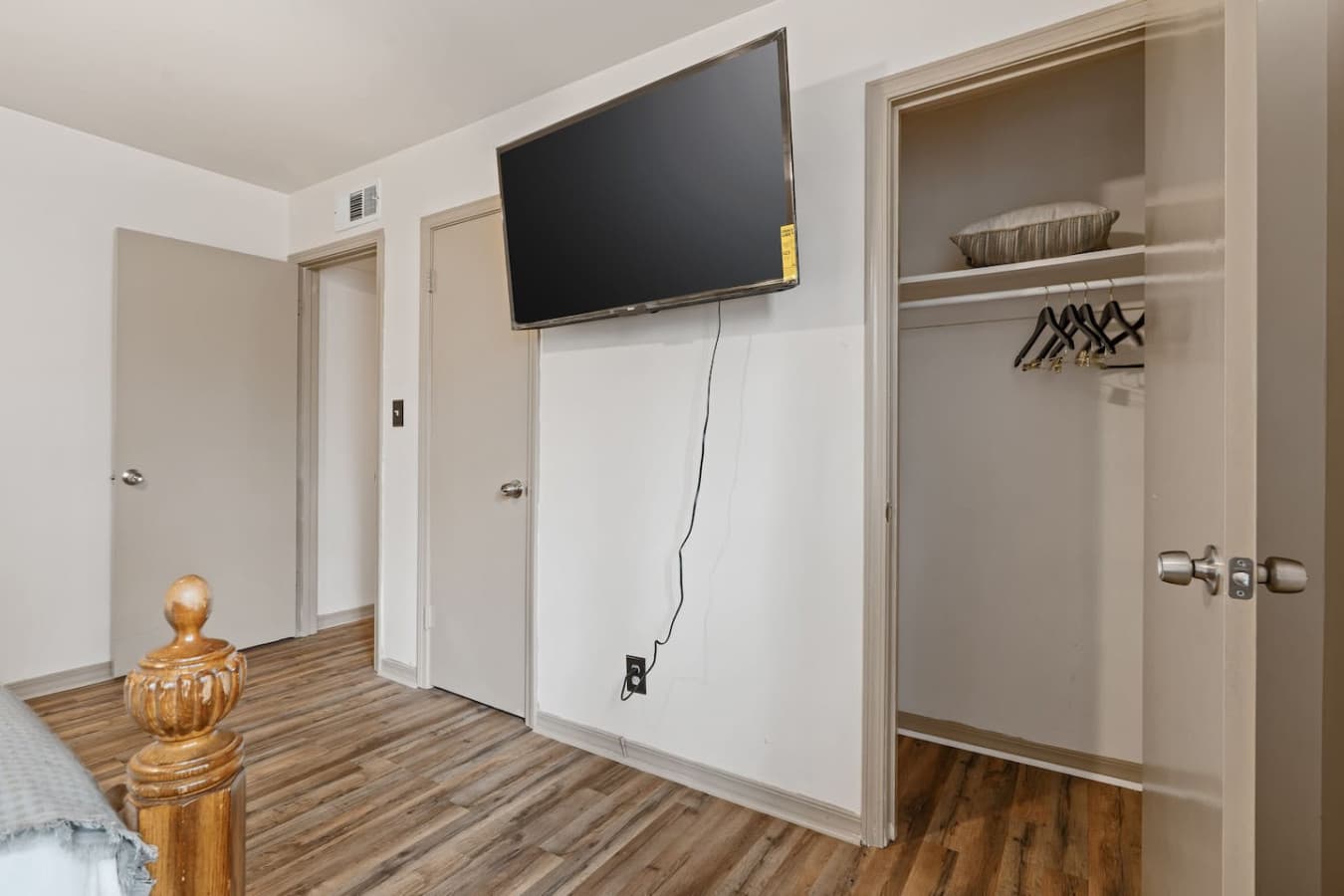 Enjoy your favorite shows on the smart TV from the comfort of this inviting queen bed.
