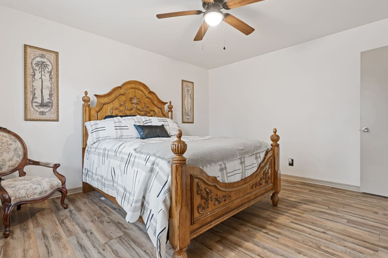 Your private retreat featuring a comfortable queen bed, smart TV, and ample storage space.