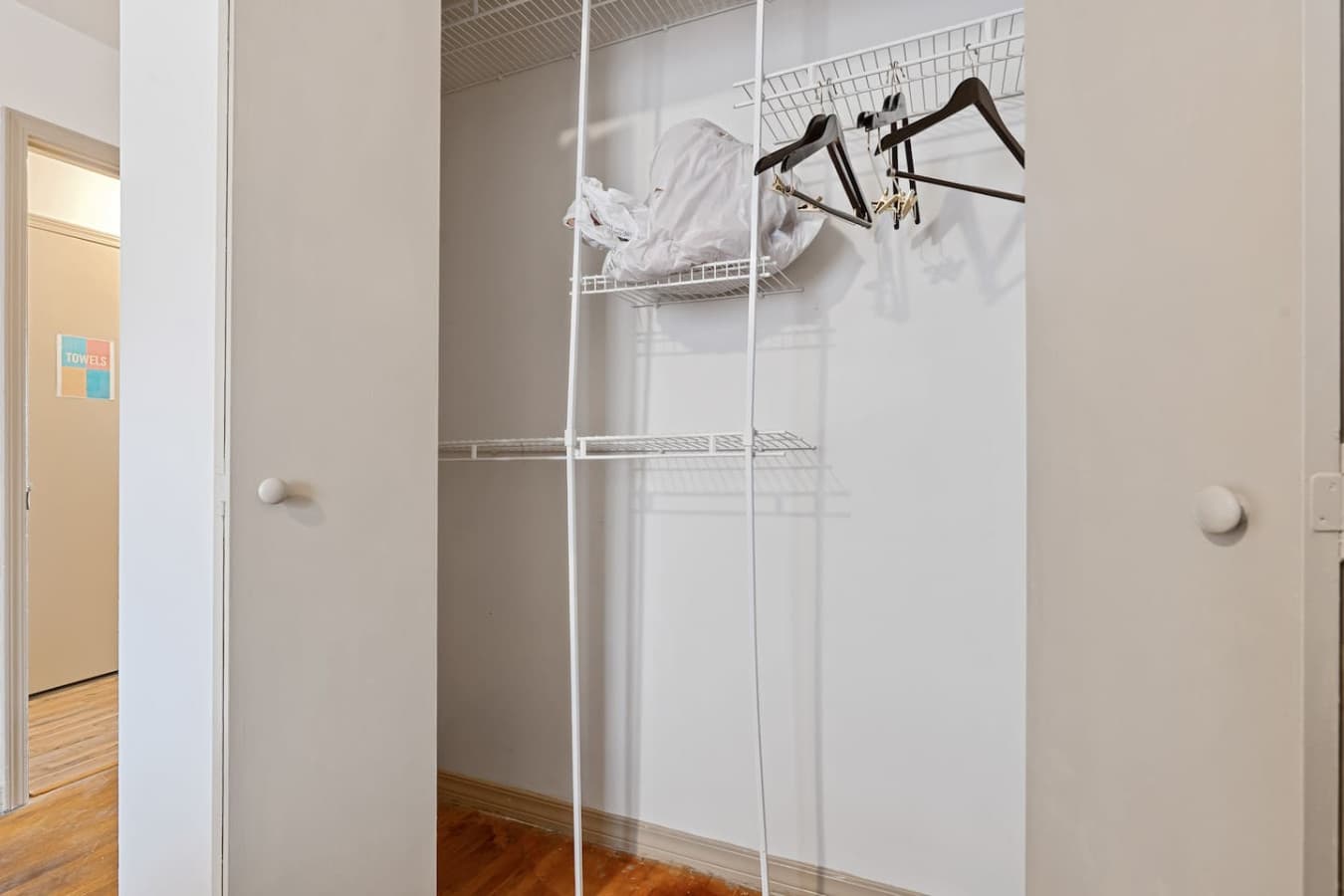 Closet and hangers provided for organizing your belongings during your stay.