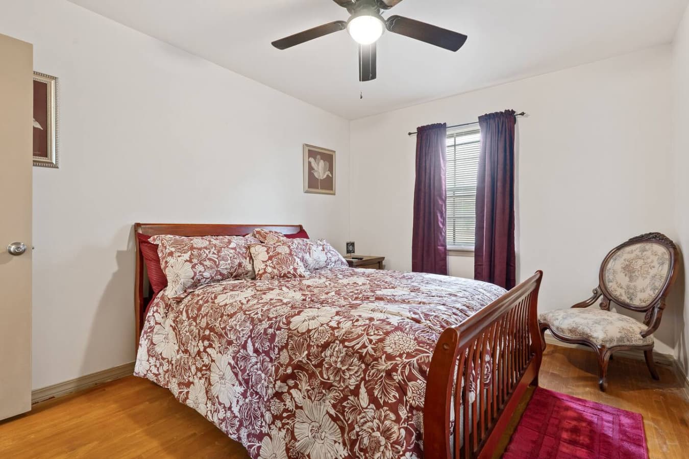 Quiet fourth bedroom perfect for unwinding with a comfortable queen bed and smart TV.