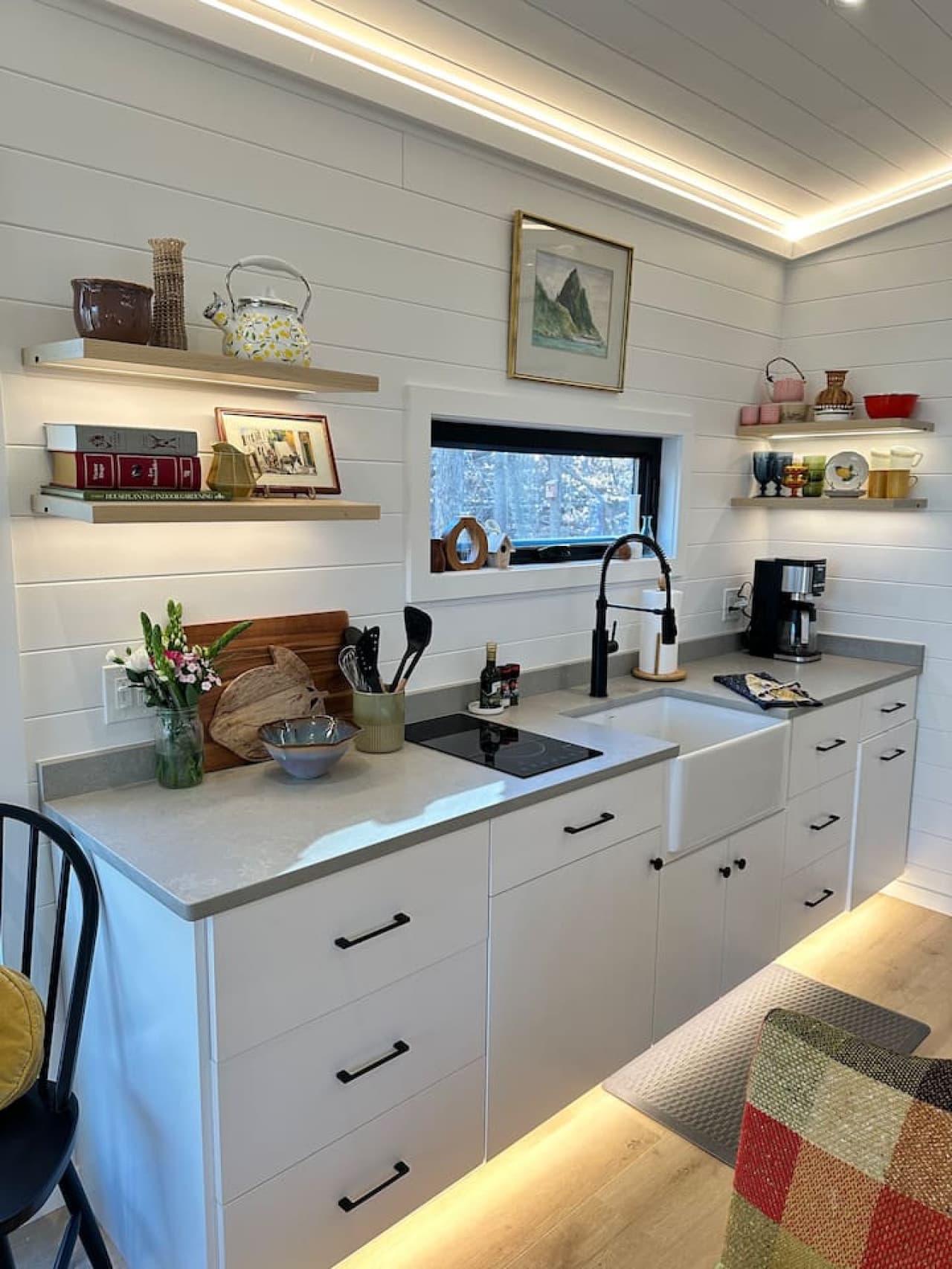 A modern kitchen with beautiful birch cabinetry and quartz countertops – ideal for preparing your favorite meals.